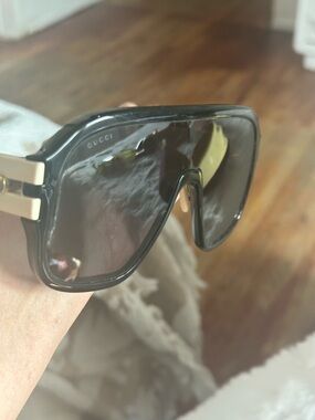 Gucci Black Shield Sunglasses with Gold Accents